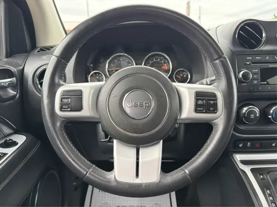 2016 Jeep Compass High Altitude Edition (1C4NJDEB2GD) with an 2.4L I-4 DOHC engine, 6A transmission, located at 8750 N County Rd 25A, Piqua, OH, 45356, (937) 908-9800, 40.164391, -84.232513 - Need a compact SUV that can handle Ohio weather, weekday commutes, and spontaneous weekend escapes without feeling bulky? This **2016 Jeep Compass High Altitude Edition 4WD** fits that lifestyle well-easy to park for errands around town, confident on wet back roads, and comfortable for longer drives - Photo#16