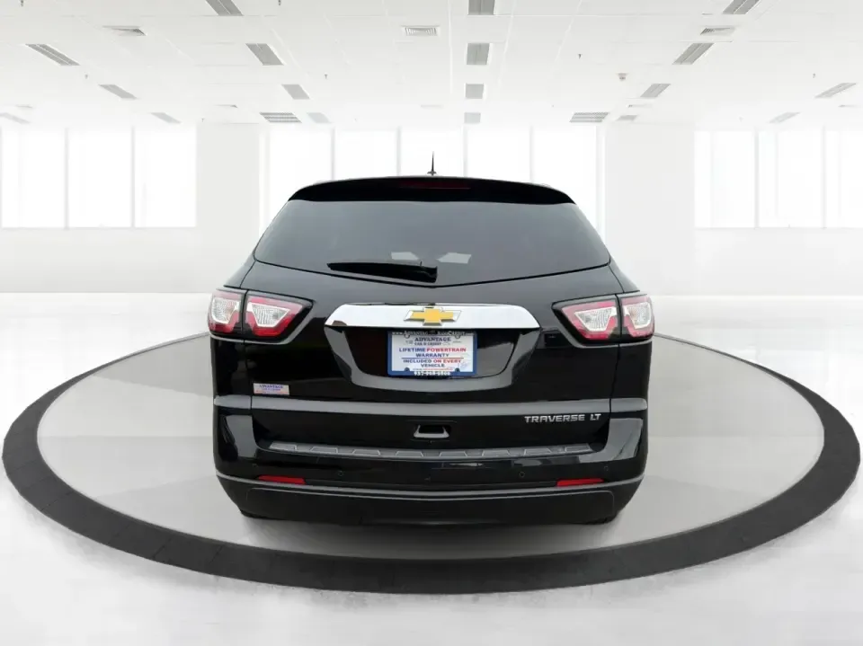 2016 Chevrolet Traverse 1LT (1GNKRGKD1GJ) with an 3.6L V-6 gasoline direct injection engine, 6A transmission, located at 8750 N County Rd 25A, Piqua, OH, 45356, (937) 908-9800, 40.164391, -84.232513 - Load up the kids, the cooler, and the weekend plans-this 2016 Chevrolet Traverse 1LT is the kind of family-ready SUV that makes school runs, long commutes, and Ohio road trips feel simpler. With three-row flexibility, a confident 3.6L V6, and everyday comfort features, it's a smart pick for growing - Photo#3