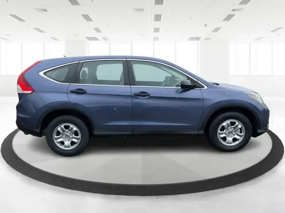 2014 Honda CR-V LX (2HKRM4H30EH) with an 2.4L I-4 DOHC engine, 5-Speed Automatic transmission, located at 401 Woodman Dr, Riverside, OH, 45431, (937) 908-9800, 39.760899, -84.123421 - Picture your next weekend: a quick run down Woodman Dr for errands, a family day at Riverscape MetroPark, or an easy I675 commute with room for groceries, strollers, and sports gear. This 2014 Honda CRV LX in Twilight Blue Metallic is the kind of practical SUV that fits real life in Riverside, Ohio- - Photo#1