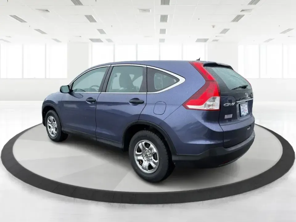 2014 Honda CR-V LX (2HKRM4H30EH) with an 2.4L I-4 DOHC engine, 5-Speed Automatic transmission, located at 401 Woodman Dr, Riverside, OH, 45431, (937) 908-9800, 39.760899, -84.123421 - Picture your next weekend: a quick run down Woodman Dr for errands, a family day at Riverscape MetroPark, or an easy I675 commute with room for groceries, strollers, and sports gear. This 2014 Honda CRV LX in Twilight Blue Metallic is the kind of practical SUV that fits real life in Riverside, Ohio- - Photo#4
