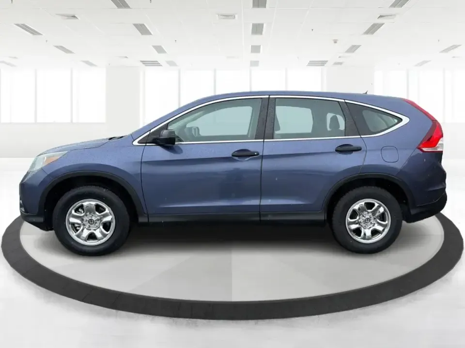 2014 Honda CR-V LX (2HKRM4H30EH) with an 2.4L I-4 DOHC engine, 5-Speed Automatic transmission, located at 401 Woodman Dr, Riverside, OH, 45431, (937) 908-9800, 39.760899, -84.123421 - Picture your next weekend: a quick run down Woodman Dr for errands, a family day at Riverscape MetroPark, or an easy I675 commute with room for groceries, strollers, and sports gear. This 2014 Honda CRV LX in Twilight Blue Metallic is the kind of practical SUV that fits real life in Riverside, Ohio- - Photo#5