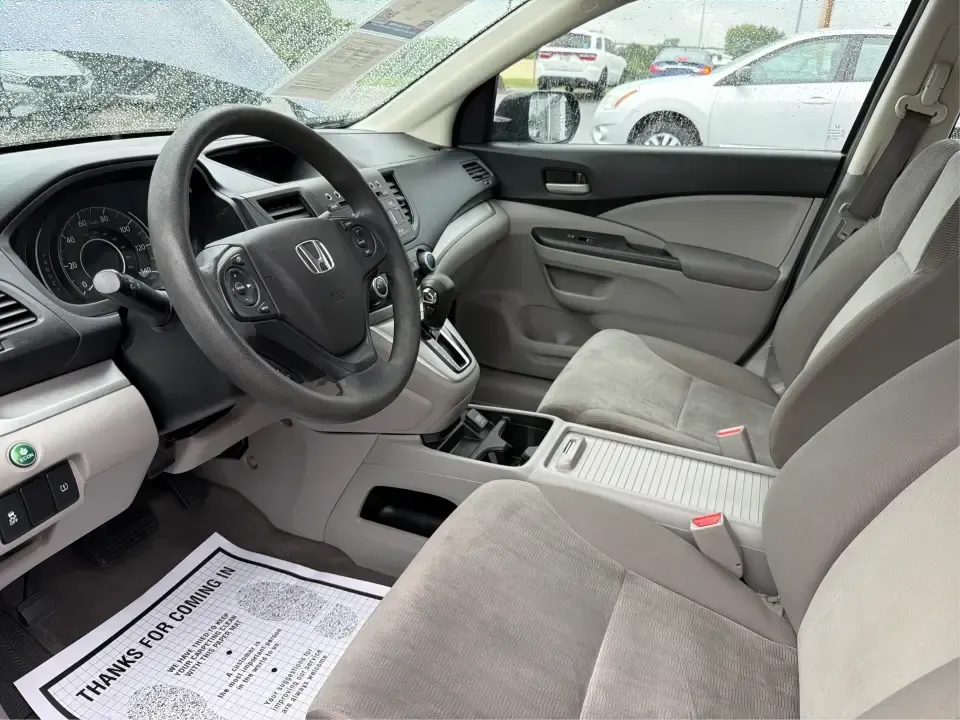 2014 Honda CR-V LX (2HKRM4H30EH) with an 2.4L I-4 DOHC engine, 5-Speed Automatic transmission, located at 401 Woodman Dr, Riverside, OH, 45431, (937) 908-9800, 39.760899, -84.123421 - Picture your next weekend: a quick run down Woodman Dr for errands, a family day at Riverscape MetroPark, or an easy I675 commute with room for groceries, strollers, and sports gear. This 2014 Honda CRV LX in Twilight Blue Metallic is the kind of practical SUV that fits real life in Riverside, Ohio- - Photo#9