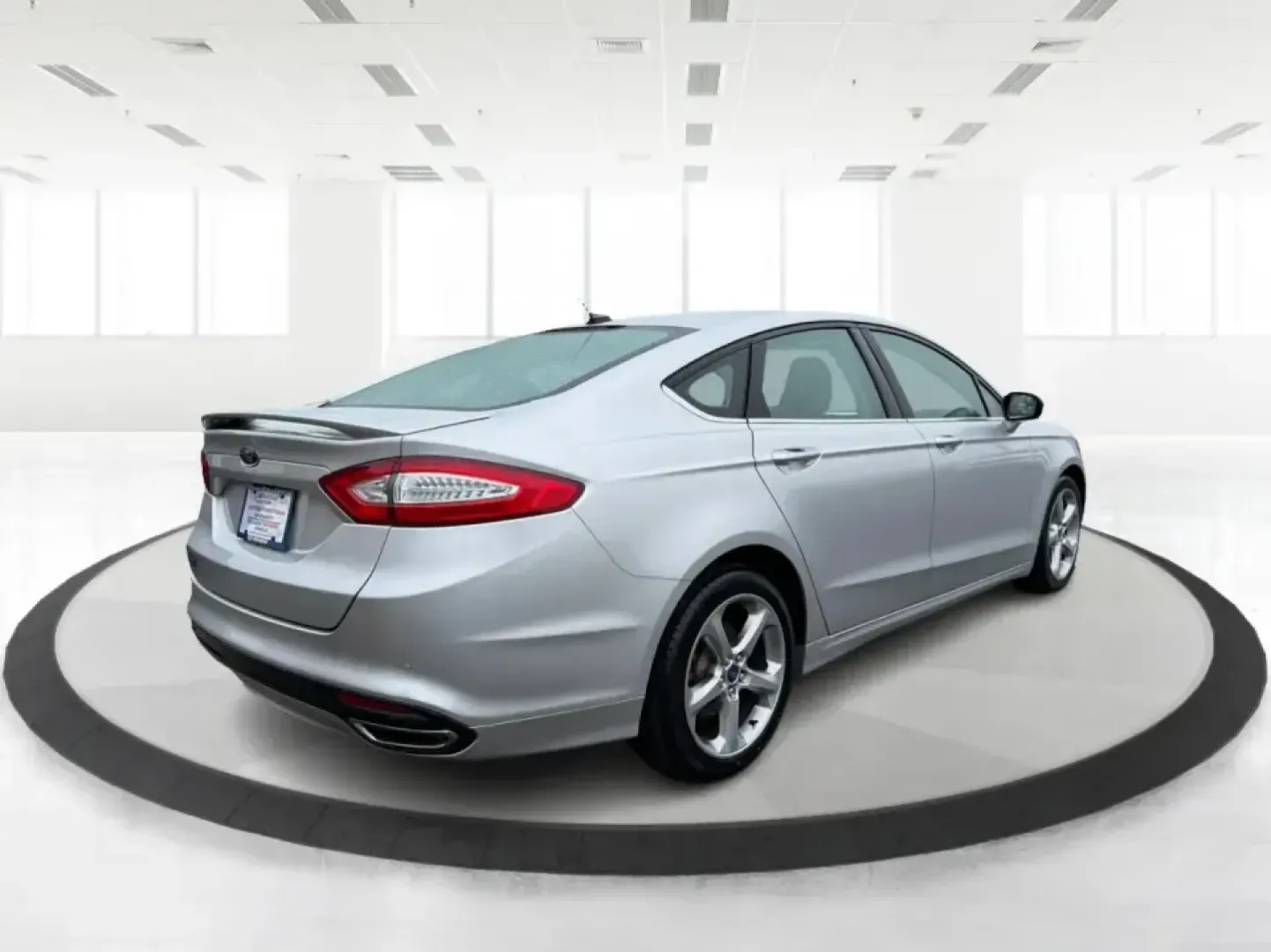 2014 Ford Fusion SE (3FA6P0H90ER) with an 2.0L L4 DOHC 16V engine, located at 1951 S Dayton Lakeview Rd., New Carlisle, OH, 45344, (937) 908-9800, 39.890999, -84.050255 - Picture your next week: smooth commutes down I70, quick errands to Kroger, and a comfortable weekend drive to Dayton or Springfield-without driving something that feels bare-bones. This 2014 Ford Fusion SE in Ingot Silver Metallic fits real life in New Carlisle, Ohio, with the kind of practical comf- Photo#2