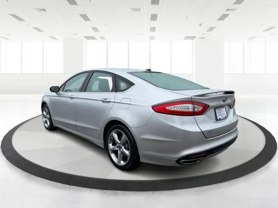 2014 Ford Fusion SE (3FA6P0H90ER) with an 2.0L L4 DOHC 16V engine, located at 1951 S Dayton Lakeview Rd., New Carlisle, OH, 45344, (937) 908-9800, 39.890999, -84.050255 - Need a smart, comfortable sedan for the daily drive from New Carlisle to Dayton, Wright-Patterson AFB, or Springfield-plus something that's still enjoyable for weekend trips to Buck Creek or an evening out near The Greene? This 2014 Ford Fusion SE blends commuter-friendly efficiency with upscale fea - Photo#4