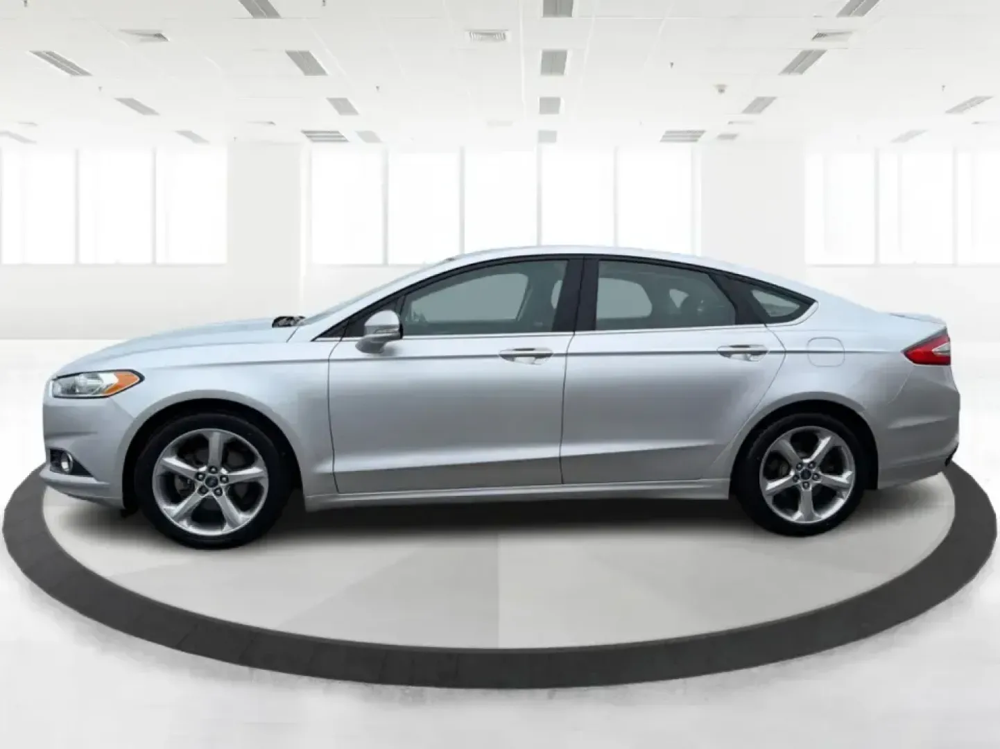 2014 Ford Fusion SE (3FA6P0H90ER) with an 2.0L L4 DOHC 16V engine, located at 1951 S Dayton Lakeview Rd., New Carlisle, OH, 45344, (937) 908-9800, 39.890999, -84.050255 - Picture your next week: smooth commutes down I70, quick errands to Kroger, and a comfortable weekend drive to Dayton or Springfield-without driving something that feels bare-bones. This 2014 Ford Fusion SE in Ingot Silver Metallic fits real life in New Carlisle, Ohio, with the kind of practical comf- Photo#5