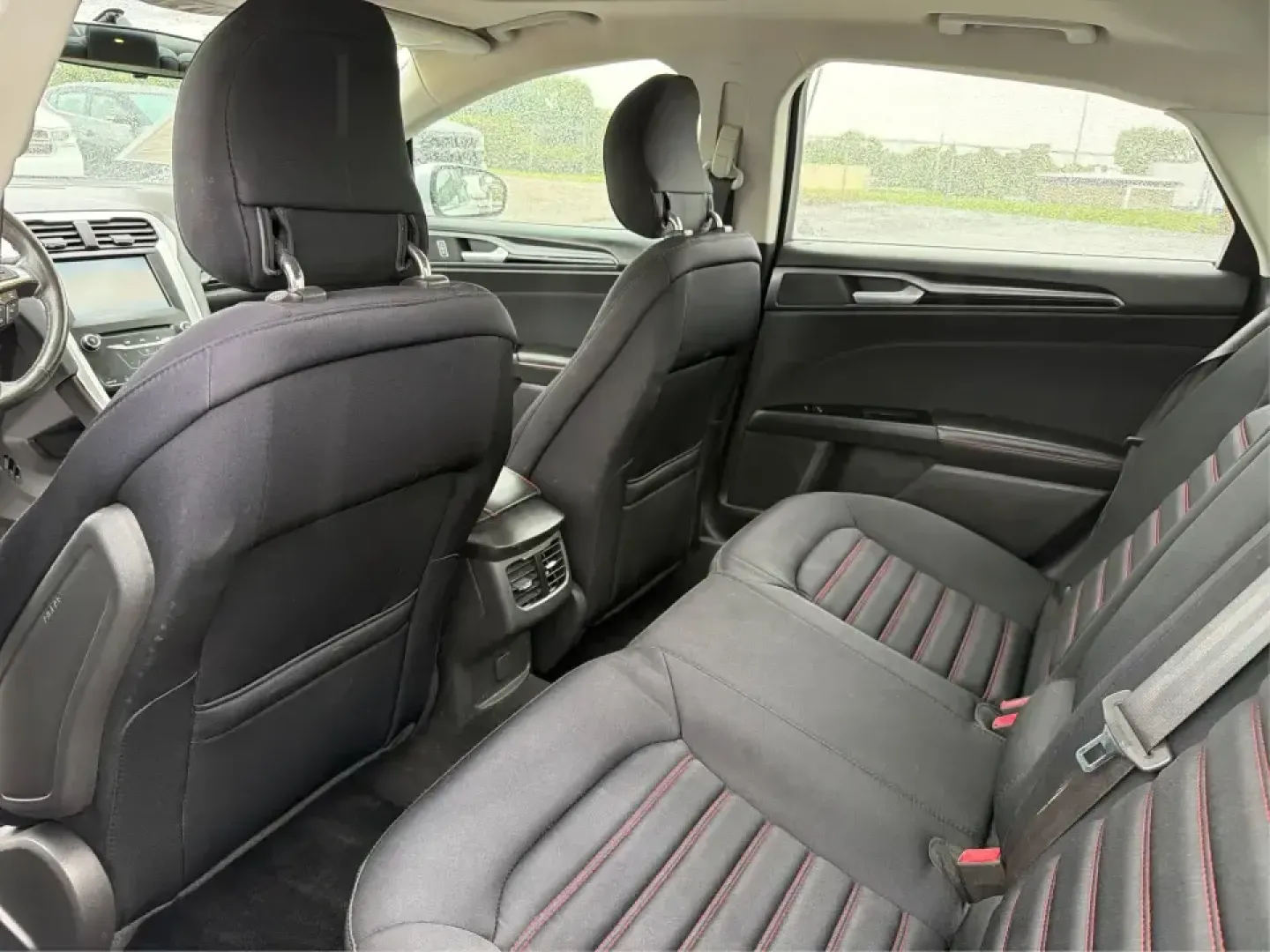 2014 Ford Fusion SE (3FA6P0H90ER) with an 2.0L L4 DOHC 16V engine, located at 1951 S Dayton Lakeview Rd., New Carlisle, OH, 45344, (937) 908-9800, 39.890999, -84.050255 - Picture your next week: smooth commutes down I70, quick errands to Kroger, and a comfortable weekend drive to Dayton or Springfield-without driving something that feels bare-bones. This 2014 Ford Fusion SE in Ingot Silver Metallic fits real life in New Carlisle, Ohio, with the kind of practical comf- Photo#10