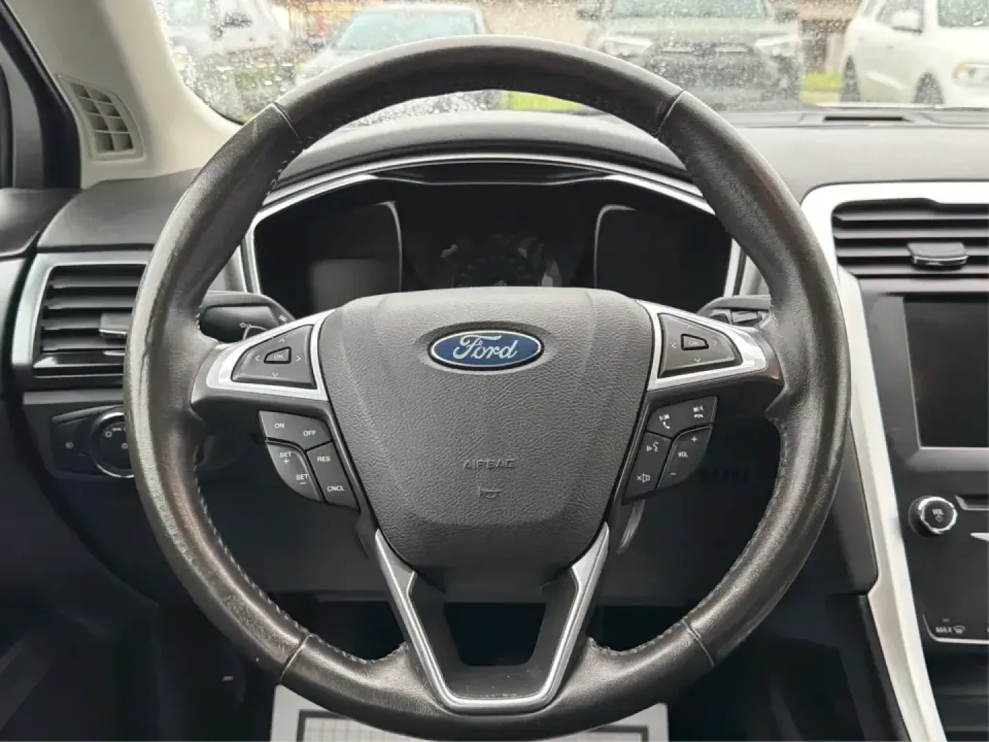 2014 Ford Fusion SE (3FA6P0H90ER) with an 2.0L L4 DOHC 16V engine, located at 1951 S Dayton Lakeview Rd., New Carlisle, OH, 45344, (937) 908-9800, 39.890999, -84.050255 - Picture your next week: smooth commutes down I70, quick errands to Kroger, and a comfortable weekend drive to Dayton or Springfield-without driving something that feels bare-bones. This 2014 Ford Fusion SE in Ingot Silver Metallic fits real life in New Carlisle, Ohio, with the kind of practical comf- Photo#16
