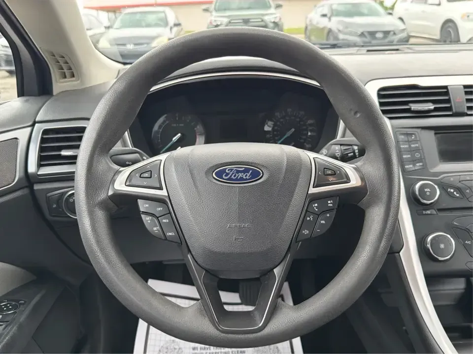 2014 Ford Fusion S (3FA6P0G78ER) with an Duratec 2.5L I-4 DOHC engine, Automatic transmission, located at 1951 S Dayton Lakeview Rd., New Carlisle, OH, 45344, (937) 908-9800, 39.890999, -84.050255 - Are you on the hunt for a reliable sedan that fits seamlessly into your everyday life? Look no further than this stunning 2014 Ford Fusion S, available now at Advantage Car and Credit in Fairborn, OH. This vehicle is the perfect choice for budget-conscious buyers or families needing a dependable rid - Photo#16