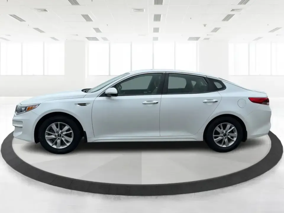2016 Kia Optima LX (KNAGT4L36G5) with an Theta II 2.4L I-4 gasoline direct injection engine, 6A transmission, located at 401 Woodman Dr, Riverside, OH, 45431, (937) 908-9800, 39.760899, -84.123421 - Need a dependable sedan that can handle the weekday commute down I-675, quick school drop-offs near Mad River, and an easy weekend drive to Carillon Historical Park or a Dayton Dragons game? This 2016 Kia Optima LX in Snow White Pearl delivers the kind of practical comfort and modern tech that fits - Photo#5