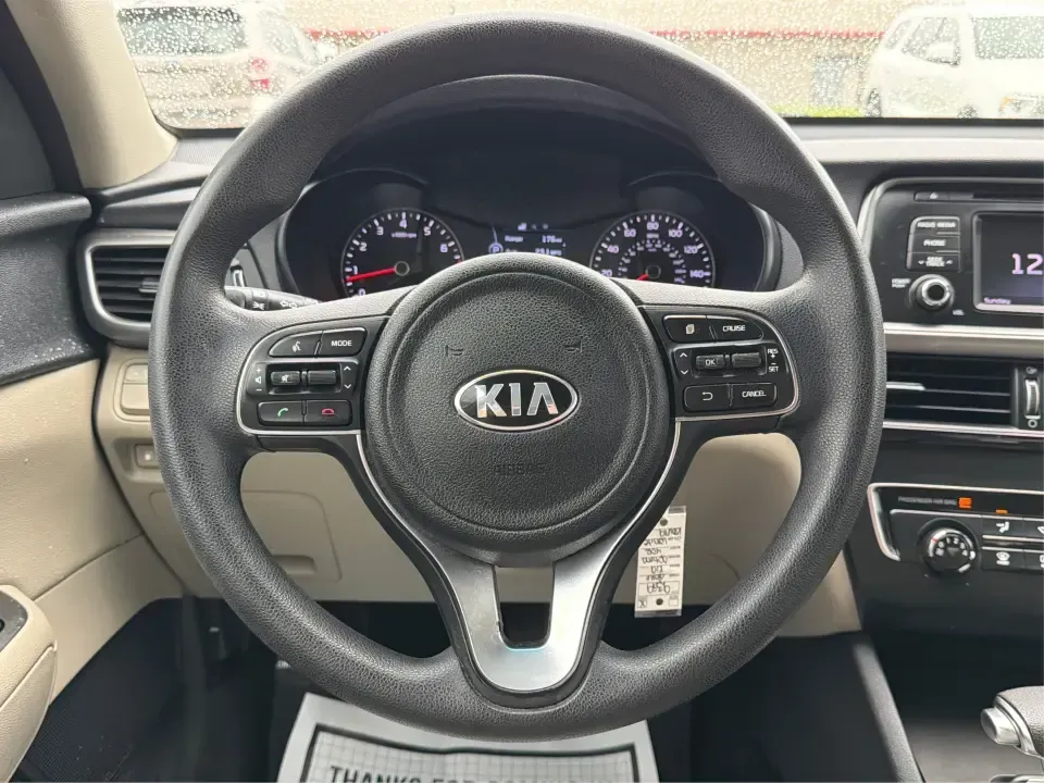 2016 Kia Optima LX (KNAGT4L36G5) with an Theta II 2.4L I-4 gasoline direct injection engine, 6A transmission, located at 401 Woodman Dr, Riverside, OH, 45431, (937) 908-9800, 39.760899, -84.123421 - Need a dependable sedan that can handle the weekday commute down I-675, quick school drop-offs near Mad River, and an easy weekend drive to Carillon Historical Park or a Dayton Dragons game? This 2016 Kia Optima LX in Snow White Pearl delivers the kind of practical comfort and modern tech that fits - Photo#16