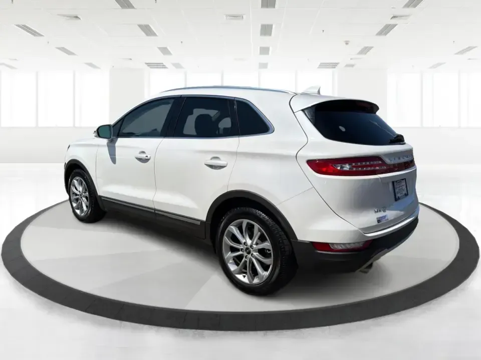 2015 Lincoln MKC AWD (5LMTJ2AH4FU) with an 2.3L L4 DOHC 16V engine, 6-Speed Automatic transmission, located at 1230 East Main St, Xenia, OH, 45385, (937) 908-9800, 39.688026, -83.910172 - Upgrade your everyday drive with a compact luxury SUV that fits real life-comfortable for long commutes up and down US-35, confident for snowy Ohio mornings, and polished enough for date night in downtown Xenia or a weekend escape to John Bryan State Park. This **2015 Lincoln MKC Base** in **White**- Photo#4