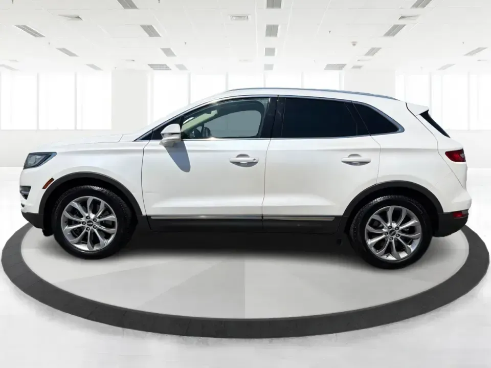 2015 Lincoln MKC AWD (5LMTJ2AH4FU) with an 2.3L L4 DOHC 16V engine, 6-Speed Automatic transmission, located at 1230 East Main St, Xenia, OH, 45385, (937) 908-9800, 39.688026, -83.910172 - Upgrade your everyday drive with a compact luxury SUV that fits real life-comfortable for long commutes up and down US-35, confident for snowy Ohio mornings, and polished enough for date night in downtown Xenia or a weekend escape to John Bryan State Park. This **2015 Lincoln MKC Base** in **White**- Photo#5