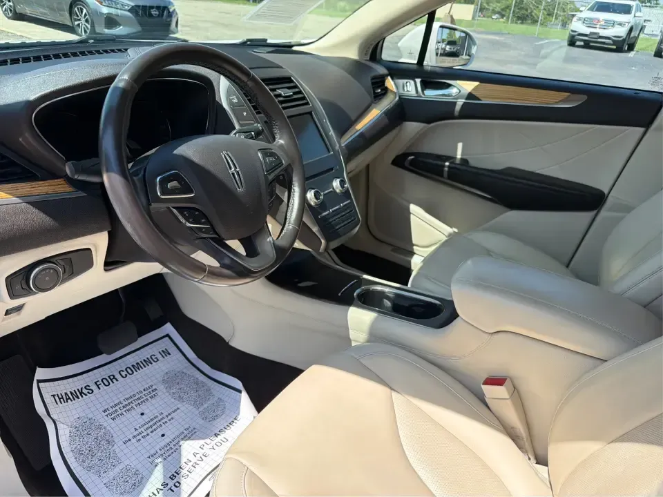 2015 Lincoln MKC AWD (5LMTJ2AH4FU) with an 2.3L L4 DOHC 16V engine, 6-Speed Automatic transmission, located at 1230 East Main St, Xenia, OH, 45385, (937) 908-9800, 39.688026, -83.910172 - Upgrade your everyday drive with a compact luxury SUV that fits real life-comfortable for long commutes up and down US-35, confident for snowy Ohio mornings, and polished enough for date night in downtown Xenia or a weekend escape to John Bryan State Park. This **2015 Lincoln MKC Base** in **White**- Photo#9