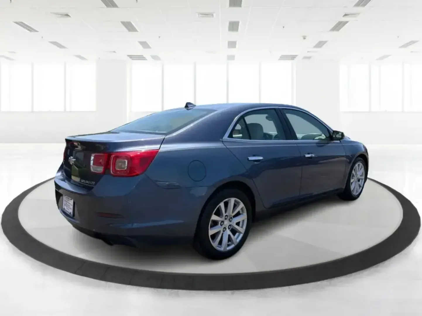 2014 Chevrolet Malibu 1TZ (1G11H5SL5EF) with an 2.5L L4 DOHC 16V engine, 6-Speed Automatic transmission, located at 401 Woodman Dr, Riverside, OH, 45431, (937) 908-9800, 39.760899, -84.123421 - Need a dependable sedan for the daily commute to Wright-Patterson AFB, quick errands down Woodman Dr, or comfortable weekend drives along I-675? This 2014 Chevrolet Malibu 1LZ in eye-catching Atlantis Blue Metallic fits real-life routines-school drop-offs, long commutes, and budget-friendly road tri- Photo#2