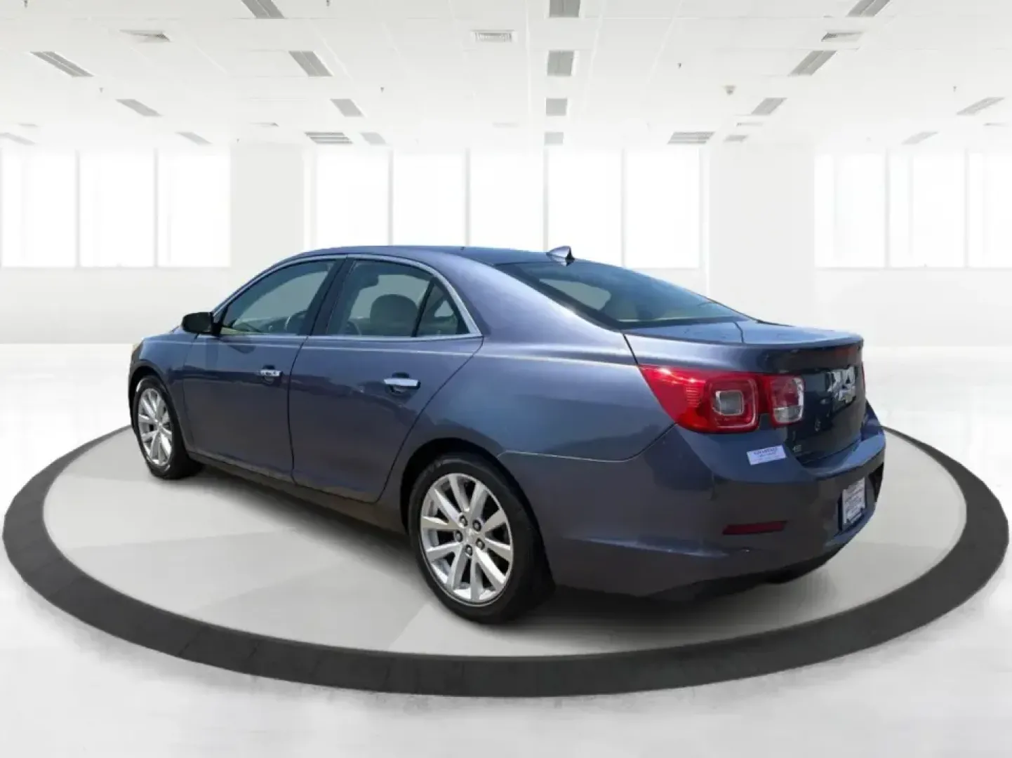 2014 Chevrolet Malibu 1TZ (1G11H5SL5EF) with an 2.5L L4 DOHC 16V engine, 6-Speed Automatic transmission, located at 401 Woodman Dr, Riverside, OH, 45431, (937) 908-9800, 39.760899, -84.123421 - Need a dependable sedan for the daily commute to Wright-Patterson AFB, quick errands down Woodman Dr, or comfortable weekend drives along I-675? This 2014 Chevrolet Malibu 1LZ in eye-catching Atlantis Blue Metallic fits real-life routines-school drop-offs, long commutes, and budget-friendly road tri- Photo#4