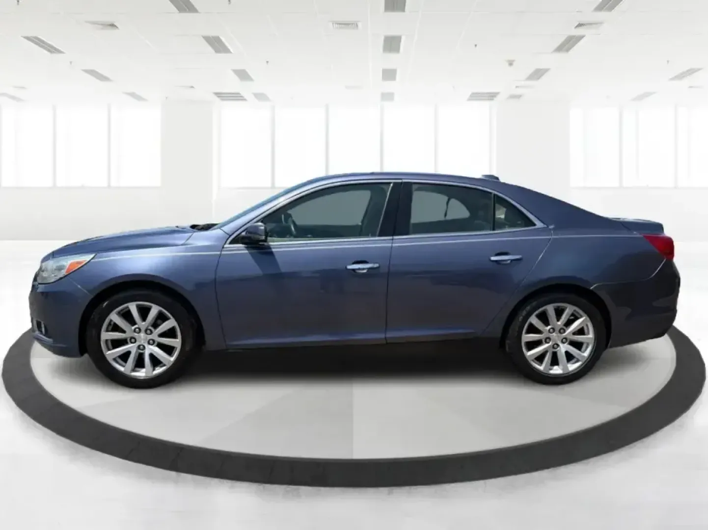 2014 Chevrolet Malibu 1TZ (1G11H5SL5EF) with an 2.5L L4 DOHC 16V engine, 6-Speed Automatic transmission, located at 401 Woodman Dr, Riverside, OH, 45431, (937) 908-9800, 39.760899, -84.123421 - Need a dependable sedan for the daily commute to Wright-Patterson AFB, quick errands down Woodman Dr, or comfortable weekend drives along I-675? This 2014 Chevrolet Malibu 1LZ in eye-catching Atlantis Blue Metallic fits real-life routines-school drop-offs, long commutes, and budget-friendly road tri- Photo#5