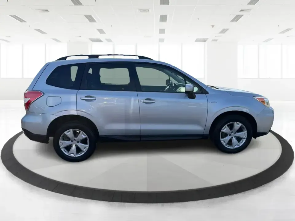 2015 Subaru Forester 2.5i Premium (JF2SJADC8FH) with an 2.5L H-4 DOHC engine, 6-Speed Automatic transmission, located at 1184 Kauffman Ave, Fairborn, OH, 45324, (937) 908-9800, 39.807072, -84.030914 - Weekend getaways to Hocking Hills, snowy commutes up I75, or everyday school-drop and grocery runs around Vandalia-this 2015 Subaru Forester 2.5i Premium is built for the kind of Ohio life that doesn't slow down when the weather changes. With Subaru practicality, a roomy hatchback-style cargo area,- Photo#1