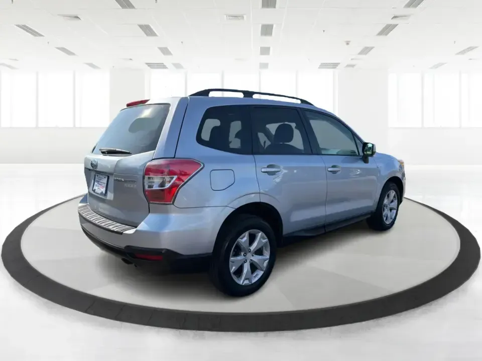 2015 Subaru Forester 2.5i Premium (JF2SJADC8FH) with an 2.5L H-4 DOHC engine, 6-Speed Automatic transmission, located at 1184 Kauffman Ave, Fairborn, OH, 45324, (937) 908-9800, 39.807072, -84.030914 - Weekend getaways to Hocking Hills, snowy commutes up I75, or everyday school-drop and grocery runs around Vandalia-this 2015 Subaru Forester 2.5i Premium is built for the kind of Ohio life that doesn't slow down when the weather changes. With Subaru practicality, a roomy hatchback-style cargo area,- Photo#2