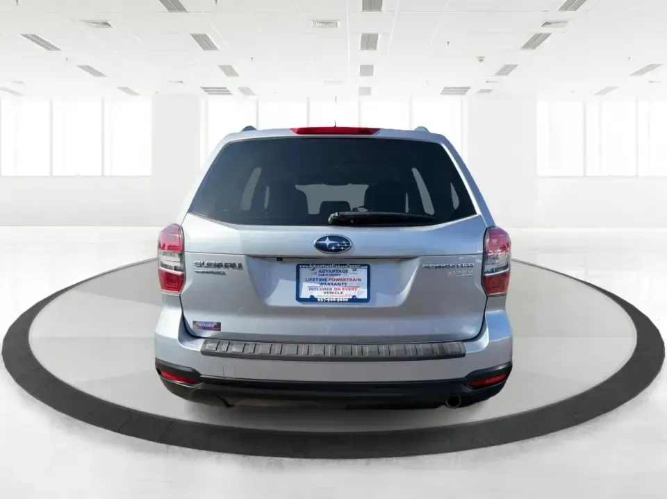 2015 Subaru Forester 2.5i Premium (JF2SJADC8FH) with an 2.5L H-4 DOHC engine, 6-Speed Automatic transmission, located at 1184 Kauffman Ave, Fairborn, OH, 45324, (937) 908-9800, 39.807072, -84.030914 - Weekend getaways to Hocking Hills, snowy commutes up I75, or everyday school-drop and grocery runs around Vandalia-this 2015 Subaru Forester 2.5i Premium is built for the kind of Ohio life that doesn't slow down when the weather changes. With Subaru practicality, a roomy hatchback-style cargo area,- Photo#3