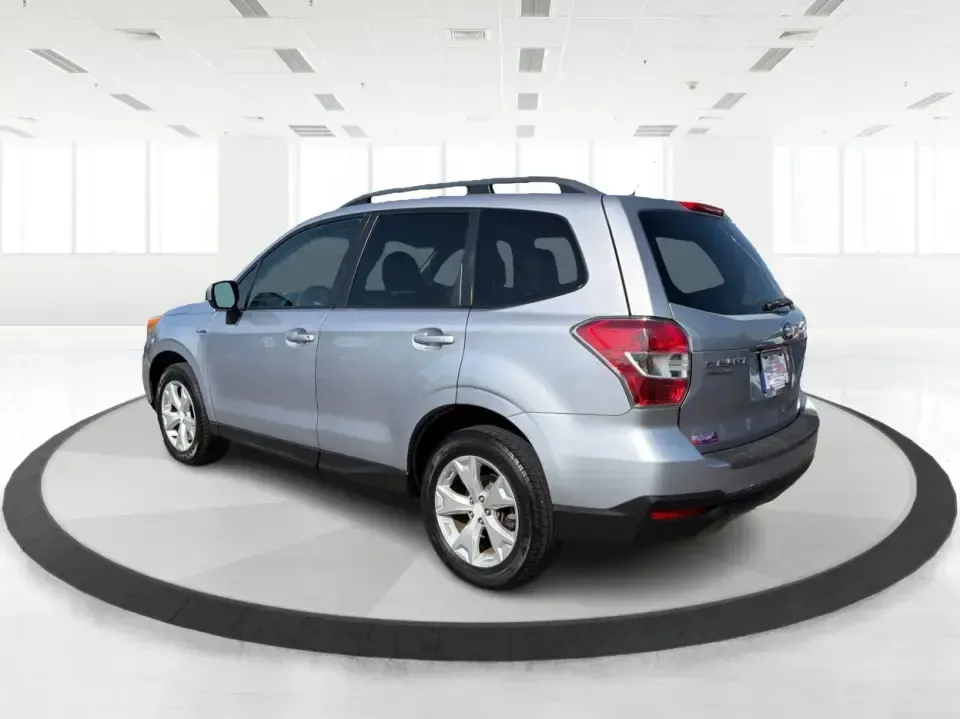 2015 Subaru Forester 2.5i Premium (JF2SJADC8FH) with an 2.5L H-4 DOHC engine, 6-Speed Automatic transmission, located at 1184 Kauffman Ave, Fairborn, OH, 45324, (937) 908-9800, 39.807072, -84.030914 - Weekend getaways to Hocking Hills, snowy commutes up I75, or everyday school-drop and grocery runs around Vandalia-this 2015 Subaru Forester 2.5i Premium is built for the kind of Ohio life that doesn't slow down when the weather changes. With Subaru practicality, a roomy hatchback-style cargo area,- Photo#4