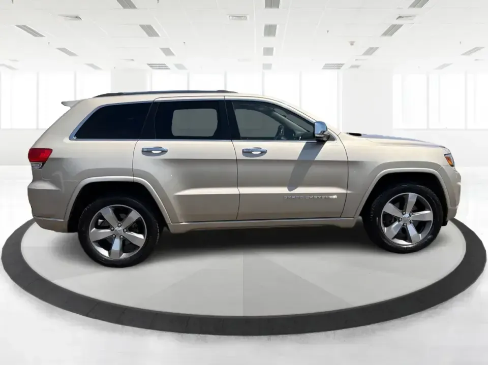 2014 Jeep Grand Cherokee Overland (1C4RJFCTXEC) with an 5.7L V8 OHV 16V engine, 5-Speed Automatic transmission, located at 1184 Kauffman Ave, Fairborn, OH, 45324, (937) 908-9800, 39.807072, -84.030914 - Picture your next weekend: loading up for a road trip to Yellow Springs, cruising I675 with the family in comfort, or heading out to the trails and backroads around Wright-Patterson Air Force Base with the confidence of 4WD. This 2014 Jeep Grand Cherokee Overland is built for drivers who want a refi - Photo#1