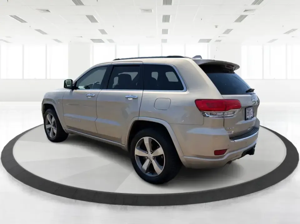2014 Jeep Grand Cherokee Overland (1C4RJFCTXEC) with an 5.7L V8 OHV 16V engine, 5-Speed Automatic transmission, located at 1184 Kauffman Ave, Fairborn, OH, 45324, (937) 908-9800, 39.807072, -84.030914 - Picture your next weekend: loading up for a road trip to Yellow Springs, cruising I675 with the family in comfort, or heading out to the trails and backroads around Wright-Patterson Air Force Base with the confidence of 4WD. This 2014 Jeep Grand Cherokee Overland is built for drivers who want a refi - Photo#4