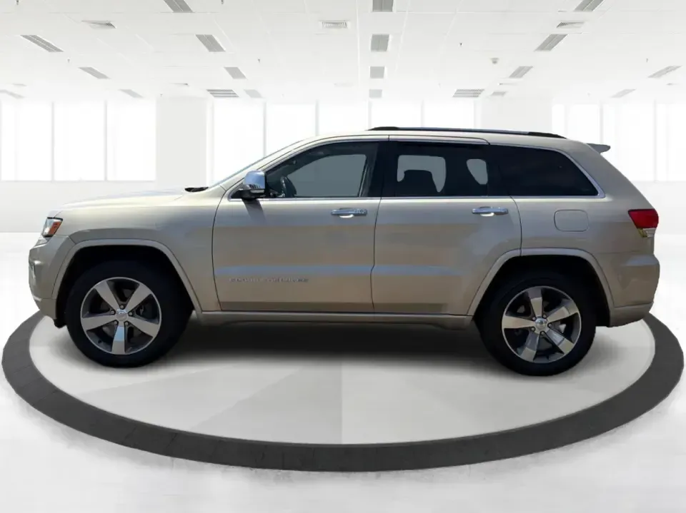2014 Jeep Grand Cherokee Overland (1C4RJFCTXEC) with an 5.7L V8 OHV 16V engine, 5-Speed Automatic transmission, located at 1184 Kauffman Ave, Fairborn, OH, 45324, (937) 908-9800, 39.807072, -84.030914 - Picture your next weekend: loading up for a road trip to Yellow Springs, cruising I675 with the family in comfort, or heading out to the trails and backroads around Wright-Patterson Air Force Base with the confidence of 4WD. This 2014 Jeep Grand Cherokee Overland is built for drivers who want a refi - Photo#5