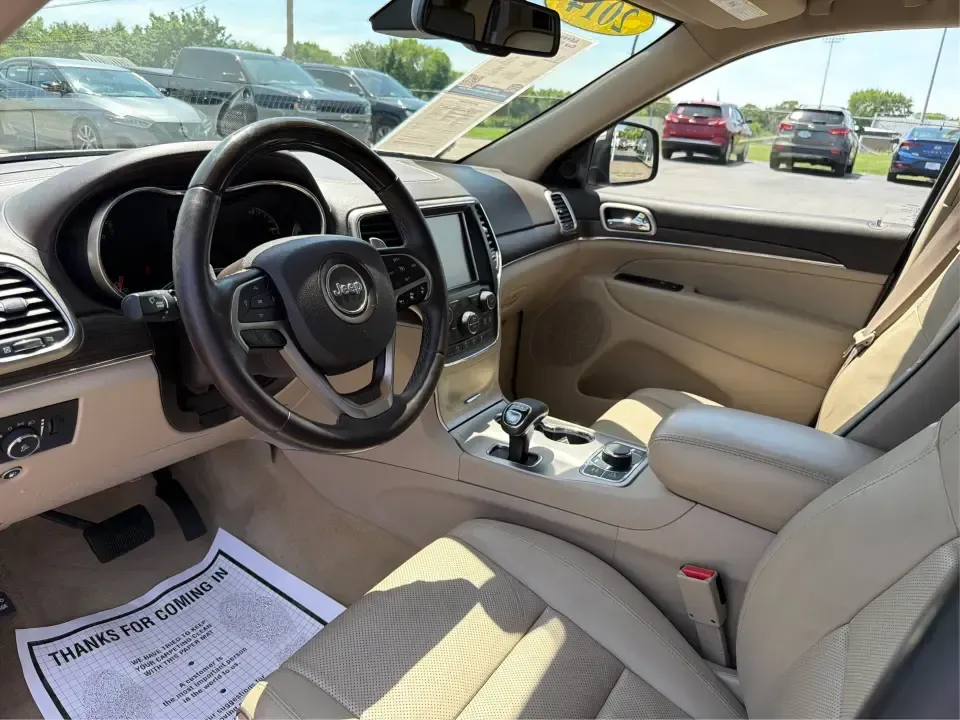 2014 Jeep Grand Cherokee Overland (1C4RJFCTXEC) with an 5.7L V8 OHV 16V engine, 5-Speed Automatic transmission, located at 1184 Kauffman Ave, Fairborn, OH, 45324, (937) 908-9800, 39.807072, -84.030914 - Picture your next weekend: loading up for a road trip to Yellow Springs, cruising I675 with the family in comfort, or heading out to the trails and backroads around Wright-Patterson Air Force Base with the confidence of 4WD. This 2014 Jeep Grand Cherokee Overland is built for drivers who want a refi - Photo#9
