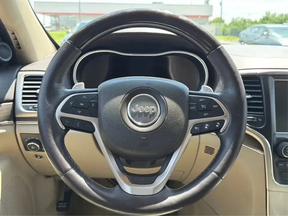 2014 Jeep Grand Cherokee Overland (1C4RJFCTXEC) with an 5.7L V8 OHV 16V engine, 5-Speed Automatic transmission, located at 1184 Kauffman Ave, Fairborn, OH, 45324, (937) 908-9800, 39.807072, -84.030914 - Picture your next weekend: loading up for a road trip to Yellow Springs, cruising I675 with the family in comfort, or heading out to the trails and backroads around Wright-Patterson Air Force Base with the confidence of 4WD. This 2014 Jeep Grand Cherokee Overland is built for drivers who want a refi - Photo#16