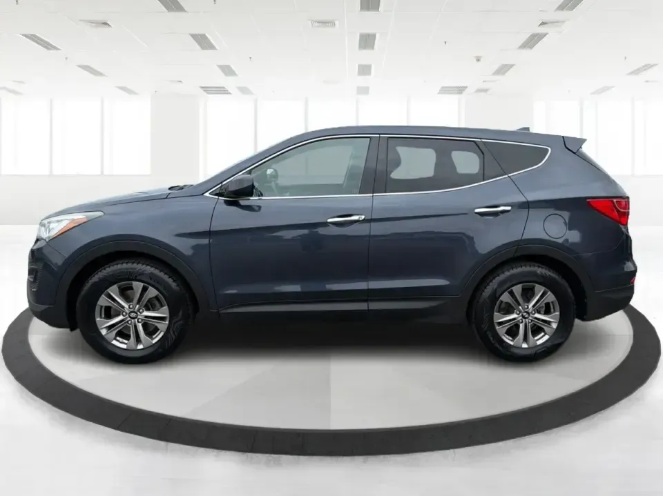 2015 Hyundai Santa Fe 2.4L (5XYZTDLB6FG) with an Theta II 2.4L I-4 gasoline direct injection engine, 6-Speed Automatic transmission, located at 401 Woodman Dr, Riverside, OH, 45431, (937) 908-9800, 39.760899, -84.123421 - Need one SUV that can handle school drop-offs, weekday commutes, and the occasional weekend escape to Eastwood MetroPark or a day trip down I-75? This 2015 Hyundai Santa Fe 2.4L in Mineral Gray fits that real-life rhythm with confident SUV versatility, family-friendly space, and comfort features tha - Photo#5