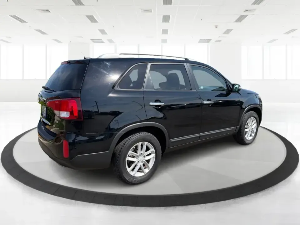 2014 Kia Sorento LX 2WD (5XYKT3A68EG) with an 2.4L L4 DOHC 16V engine, 6-Speed Automatic transmission, located at 8750 N County Rd 25A, Piqua, OH, 45356, (937) 908-9800, 40.164391, -84.232513 - Weekend road trips to Indian Lake, daily commutes down I-75, or hauling sports gear across Troy-this 2014 Kia Sorento LX is the kind of SUV that fits real life. Finished in Ebony Black and built for practicality, it's a smart pick for growing families, busy professionals, and budget-conscious buyers- Photo#2