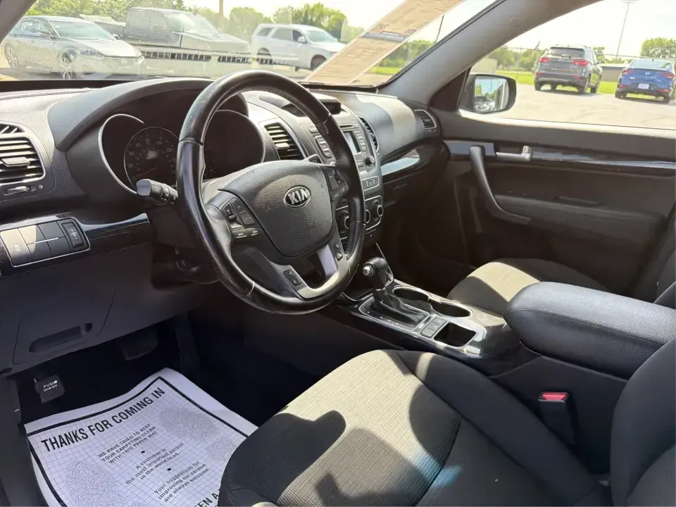 2014 Kia Sorento LX 2WD (5XYKT3A68EG) with an 2.4L L4 DOHC 16V engine, 6-Speed Automatic transmission, located at 8750 N County Rd 25A, Piqua, OH, 45356, (937) 908-9800, 40.164391, -84.232513 - Weekend road trips to Indian Lake, daily commutes down I-75, or hauling sports gear across Troy-this 2014 Kia Sorento LX is the kind of SUV that fits real life. Finished in Ebony Black and built for practicality, it's a smart pick for growing families, busy professionals, and budget-conscious buyers- Photo#9