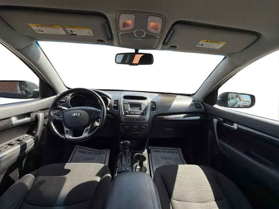 2014 Kia Sorento LX 2WD (5XYKT3A68EG) with an 2.4L L4 DOHC 16V engine, 6-Speed Automatic transmission, located at 8750 N County Rd 25A, Piqua, OH, 45356, (937) 908-9800, 40.164391, -84.232513 - Weekend road trips to Indian Lake, daily commutes down I-75, or hauling sports gear across Troy-this 2014 Kia Sorento LX is the kind of SUV that fits real life. Finished in Ebony Black and built for practicality, it's a smart pick for growing families, busy professionals, and budget-conscious buyers- Photo#19