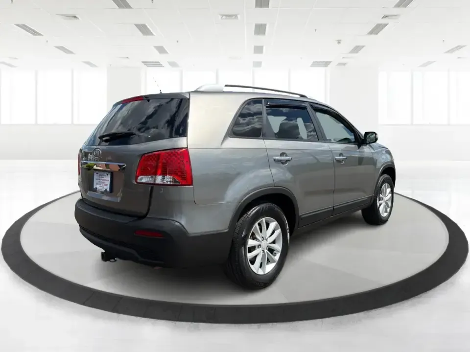 2013 Kia Sorento LX 2WD (5XYKT3A69DG) with an 2.4L L4 DOHC 16V engine, 6-Speed Automatic transmission, located at 8750 N County Rd 25A, Piqua, OH, 45356, (937) 908-9800, 40.164391, -84.232513 - Pack up the kids, load the cooler, and point your weekend plans toward Indian Lake or a quick getaway down I-75-this 2013 Kia Sorento LX 2WD is the kind of practical SUV that fits real life in Piqua. With roomy seating, flexible cargo space, and everyday comfort, it's a smart pick for growing famili - Photo#2