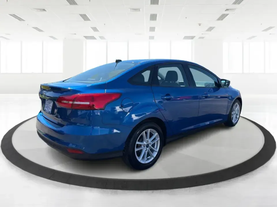2018 Ford Focus SE (1FADP3F22JL) with an 2.0L L4 DOHC 16V engine, Automatic transmission, located at 4508 South Dixie Dr, Moraine, OH, 45439, (937) 908-9800, 39.689976, -84.218452 - Need a smart, efficient sedan for daily commutes down South Dixie Drive, quick runs to the Moraine Walmart area, or a reliable ride for work in Dayton and back? This 2018 Ford Focus SE is built for real life-easy to park, comfortable for longer drives, and fuel-friendly for the weekly grind. Finishe - Photo#2