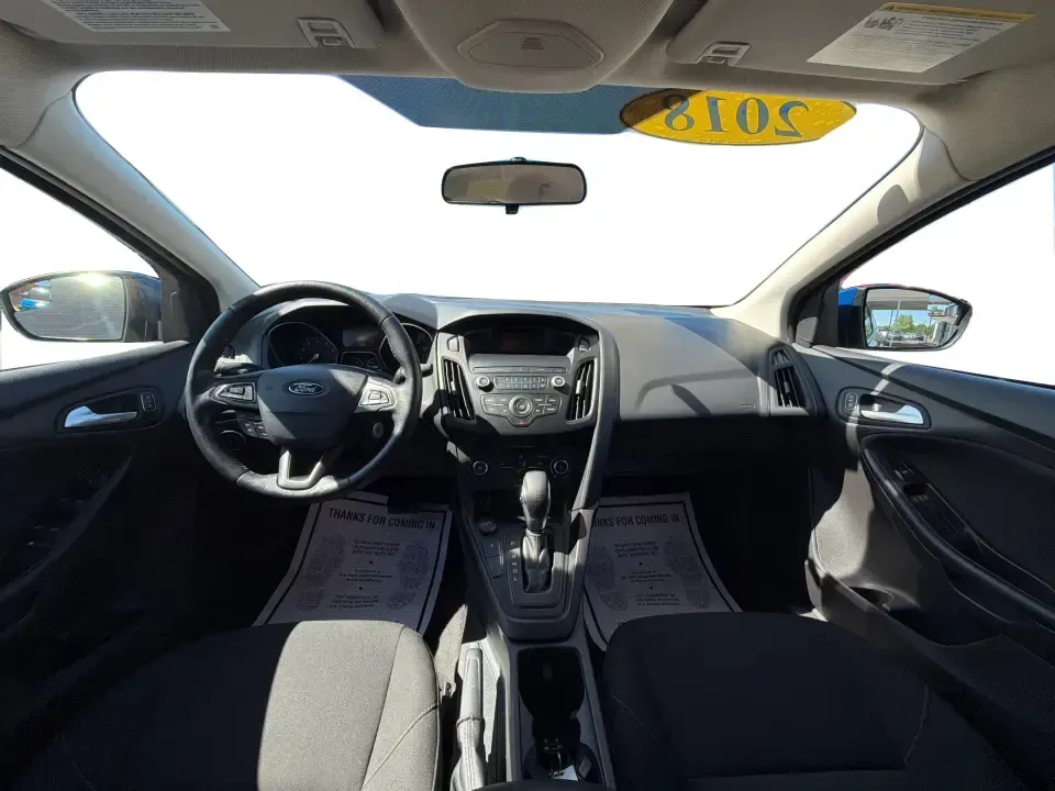 2018 Ford Focus SE (1FADP3F22JL) with an 2.0L L4 DOHC 16V engine, Automatic transmission, located at 4508 South Dixie Dr, Moraine, OH, 45439, (937) 908-9800, 39.689976, -84.218452 - Need a smart, efficient sedan for daily commutes down South Dixie Drive, quick runs to the Moraine Walmart area, or a reliable ride for work in Dayton and back? This 2018 Ford Focus SE is built for real life-easy to park, comfortable for longer drives, and fuel-friendly for the weekly grind. Finishe - Photo#20