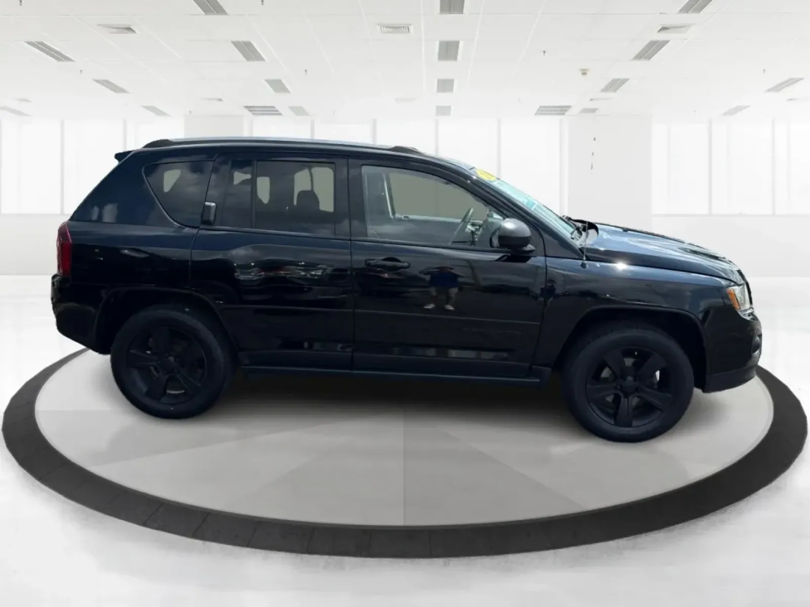 2016 Jeep Compass Sport (1C4NJDBB5GD) with an 2.4L I-4 DOHC engine, located at 1099 N County Rd 25A , Troy, OH, 45373, (937) 908-9800, 40.057079, -84.212883 - **Adventure Awaits with this 2016 Jeep Compass Sport Perfect for Weekend Getaways!**<br /> <br /> Are you looking for a vehicle that combines style, functionality, and reliability for your next adventure? Look no further than this 2016 Jeep Compass Sport, available now at Advantage Car and Credit i - Photo#1