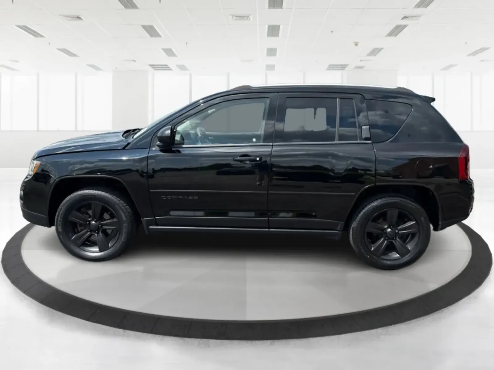 2016 Jeep Compass Sport (1C4NJDBB5GD) with an 2.4L I-4 DOHC engine, located at 1099 N County Rd 25A , Troy, OH, 45373, (937) 908-9800, 40.057079, -84.212883 - **Adventure Awaits with this 2016 Jeep Compass Sport Perfect for Weekend Getaways!**<br /> <br /> Are you looking for a vehicle that combines style, functionality, and reliability for your next adventure? Look no further than this 2016 Jeep Compass Sport, available now at Advantage Car and Credit i - Photo#5