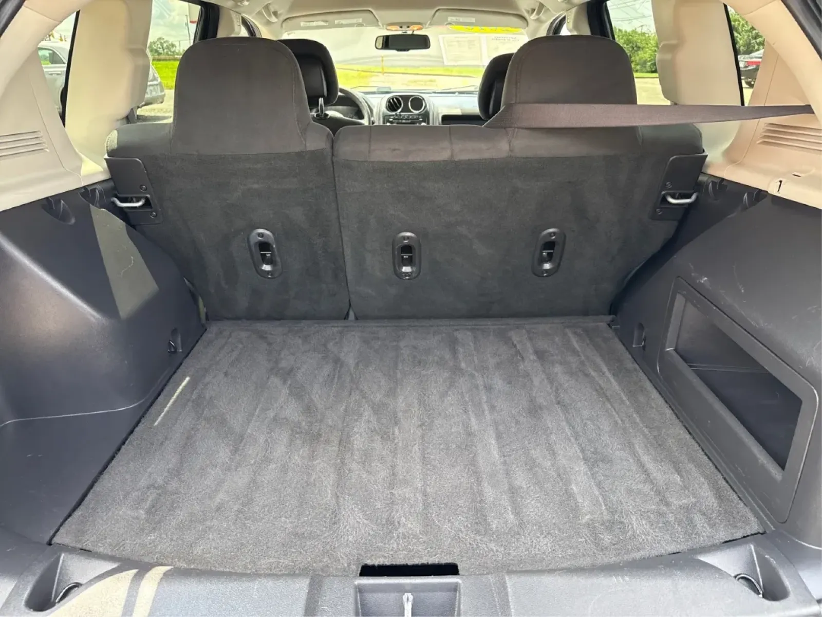 2016 Jeep Compass Sport (1C4NJDBB5GD) with an 2.4L I-4 DOHC engine, located at 1099 N County Rd 25A , Troy, OH, 45373, (937) 908-9800, 40.057079, -84.212883 - **Adventure Awaits with this 2016 Jeep Compass Sport Perfect for Weekend Getaways!**<br /> <br /> Are you looking for a vehicle that combines style, functionality, and reliability for your next adventure? Look no further than this 2016 Jeep Compass Sport, available now at Advantage Car and Credit i - Photo#12