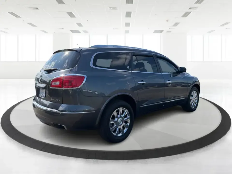 2013 Buick Enclave Leather (5GAKRCKD0DJ) with an 3.6L V-6 gasoline direct injection engine, 6-Speed Automatic Overdrive transmission, located at 1230 East Main St, Xenia, OH, 45385, (937) 908-9800, 39.688026, -83.910172 - Pack the kids for school drop-offs in the morning, load up for a weekend at the National Museum of the U.S. Air Force, or cruise I75 with friends headed toward downtown Dayton-this 2013 Buick Enclave Leather is built for real-life comfort with a premium feel. Finished in Atlantis Blue Metallic and d - Photo#2