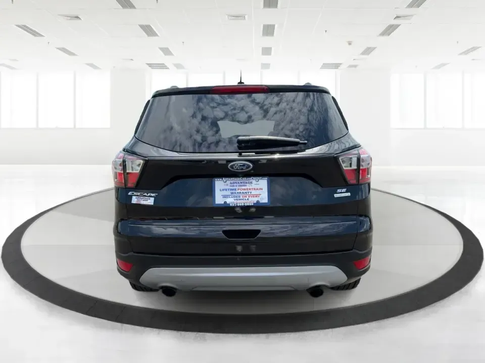 2017 Ford Escape SE (1FMCU0GD1HU) with an 1.5L L4 DOHC 16V engine, 6A transmission, located at 880 E. National Road, Vandalia, OH, 45377, (937) 908-9800, 39.891918, -84.183594 - Need a compact SUV that can handle the weekday commute on I75, school drop-offs around Troy, and spontaneous weekend getaways to Charleston Falls Preserve or a quick stroll through the Troy Strawberry Festival? This 2017 Ford Escape SE in Shadow Black is a practical, easy-to-live-with choice for bus- Photo#3