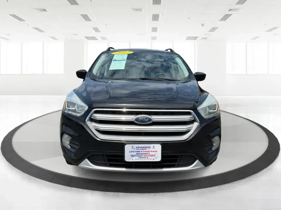 2017 Ford Escape SE (1FMCU0GD1HU) with an 1.5L L4 DOHC 16V engine, 6A transmission, located at 880 E. National Road, Vandalia, OH, 45377, (937) 908-9800, 39.891918, -84.183594 - Need a compact SUV that can handle the weekday commute on I75, school drop-offs around Troy, and spontaneous weekend getaways to Charleston Falls Preserve or a quick stroll through the Troy Strawberry Festival? This 2017 Ford Escape SE in Shadow Black is a practical, easy-to-live-with choice for bus- Photo#7