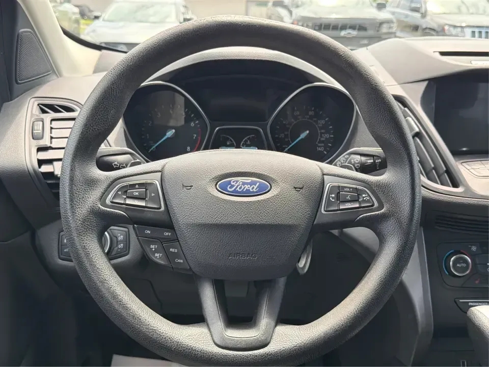 2017 Ford Escape SE (1FMCU0GD1HU) with an 1.5L L4 DOHC 16V engine, 6A transmission, located at 880 E. National Road, Vandalia, OH, 45377, (937) 908-9800, 39.891918, -84.183594 - Need a compact SUV that can handle the weekday commute on I75, school drop-offs around Troy, and spontaneous weekend getaways to Charleston Falls Preserve or a quick stroll through the Troy Strawberry Festival? This 2017 Ford Escape SE in Shadow Black is a practical, easy-to-live-with choice for bus- Photo#16