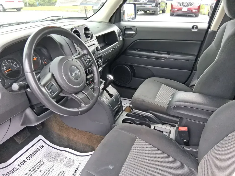 2016 Jeep Patriot Latitude 4WD (1C4NJRFB0GD) with an 2.4L L4 DOHC 16V engine, located at 1184 Kauffman Ave, Fairborn, OH, 45324, (937) 908-9800, 39.807072, -84.030914 - Weekend lake runs, snowy school mornings, and everyday commuting across the Miami Valley all get easier in a compact SUV that's ready when Ohio weather changes its mind. This **2016 Jeep Patriot Latitude 4WD** is a practical choice for drivers who want the Jeep look and capability in an affordable,- Photo#9