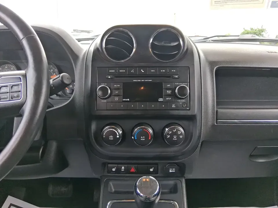 2016 Jeep Patriot Latitude 4WD (1C4NJRFB0GD) with an 2.4L L4 DOHC 16V engine, located at 1184 Kauffman Ave, Fairborn, OH, 45324, (937) 908-9800, 39.807072, -84.030914 - Weekend lake runs, snowy school mornings, and everyday commuting across the Miami Valley all get easier in a compact SUV that's ready when Ohio weather changes its mind. This **2016 Jeep Patriot Latitude 4WD** is a practical choice for drivers who want the Jeep look and capability in an affordable,- Photo#13
