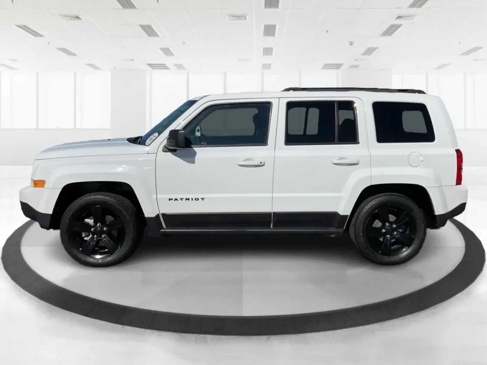 2015 Jeep Patriot Altitude Edition (1C4NJPBA1FD) with an 2L I-4 DOHC engine, located at 880 E. National Road, Vandalia, OH, 45377, (937) 908-9800, 39.891918, -84.183594 - Are you ready to elevate your adventures and embrace a life filled with excitement? If you're a weekend wanderer or a growing family looking for a reliable SUV, the 2015 Jeep Patriot Altitude Edition at Advantage Car and Credit is here to meet your needs. With its spacious interior, rugged design, a - Photo#3