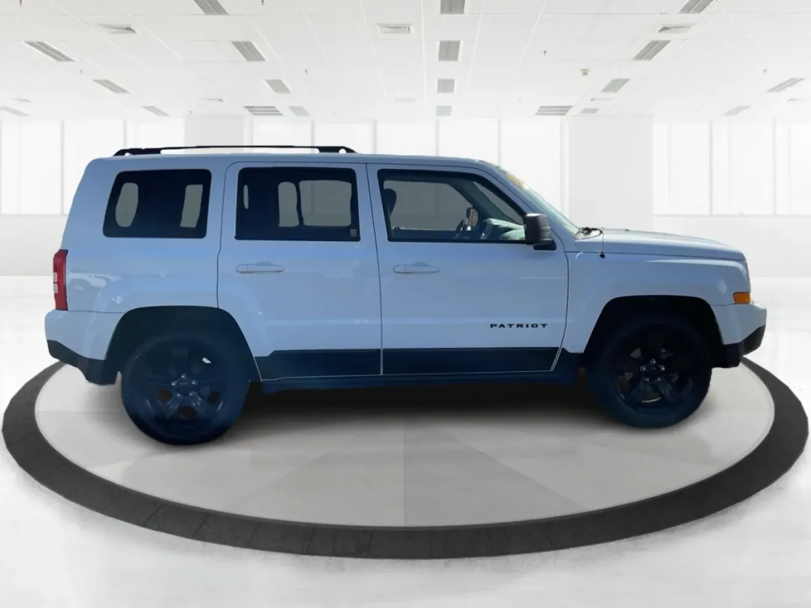 2015 Jeep Patriot Altitude Edition (1C4NJPBA1FD) with an 2L I-4 DOHC engine, located at 1951 S Dayton Lakeview Rd., New Carlisle, OH, 45344, (937) 908-9800, 39.890999, -84.050255 - Are you ready to elevate your adventures and embrace a life filled with excitement? If you're a weekend wanderer or a growing family looking for a reliable SUV, the 2015 Jeep Patriot Altitude Edition at Advantage Car and Credit is here to meet your needs. With its spacious interior, rugged design, a - Photo#1