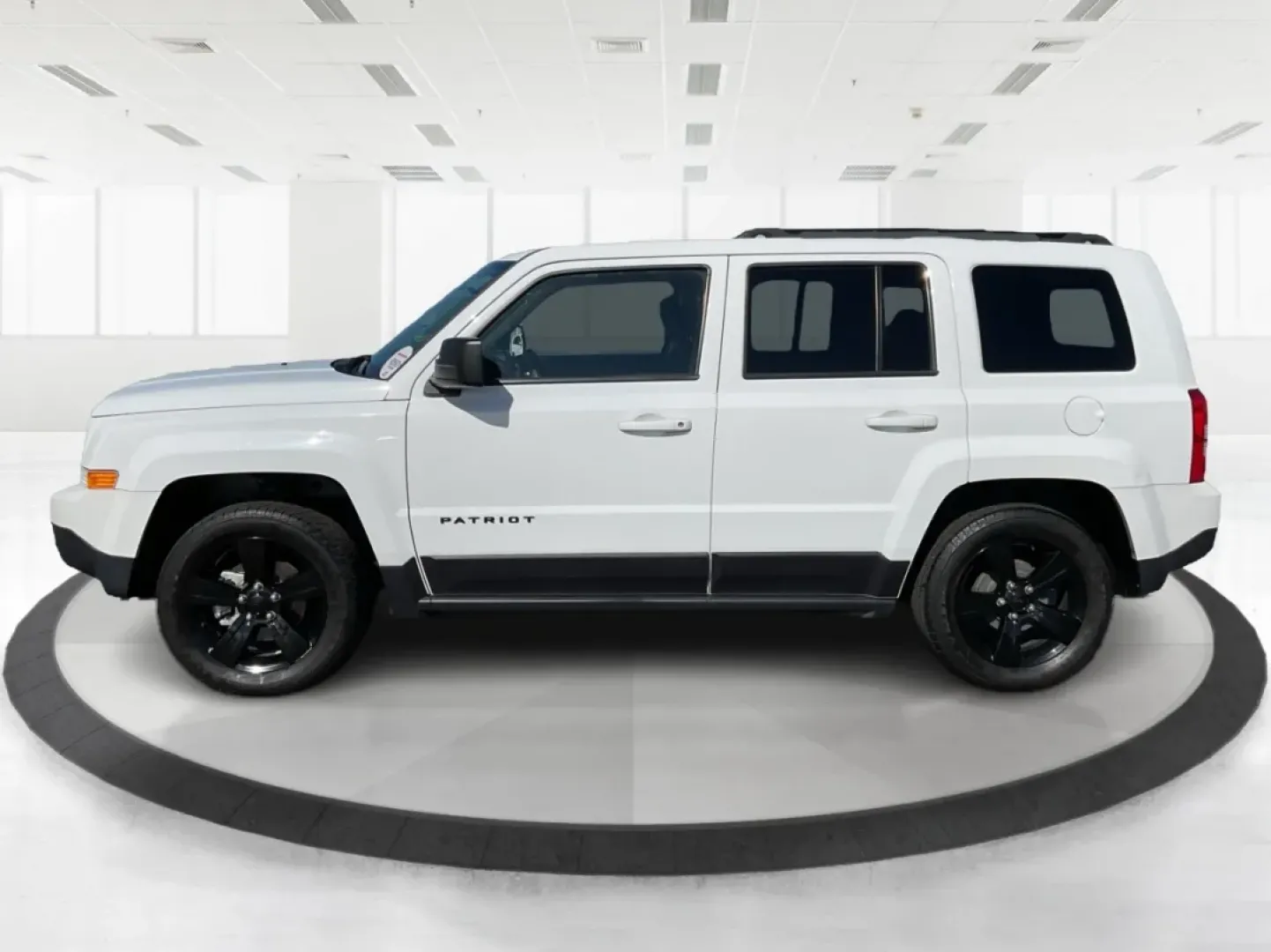 2015 Jeep Patriot Altitude Edition (1C4NJPBA1FD) with an 2L I-4 DOHC engine, located at 1951 S Dayton Lakeview Rd., New Carlisle, OH, 45344, (937) 908-9800, 39.890999, -84.050255 - Are you ready to elevate your adventures and embrace a life filled with excitement? If you're a weekend wanderer or a growing family looking for a reliable SUV, the 2015 Jeep Patriot Altitude Edition at Advantage Car and Credit is here to meet your needs. With its spacious interior, rugged design, a - Photo#3