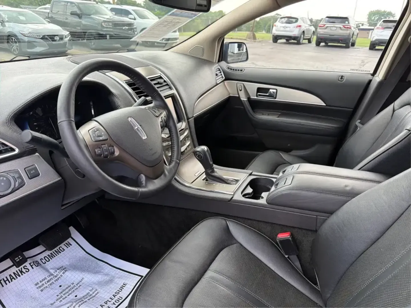 2012 Lincoln MKX Base (2LMDJ8JK1CB) with an 3.7L V6 DOHC 24V engine, 6-Speed Automatic transmission, located at 401 Woodman Dr, Riverside, OH, 45431, (937) 908-9800, 39.760899, -84.123421 - Need a comfortable, confident SUV for daily commuting to Wright-Patterson AFB, school drop-offs in Beavercreek, and weekend runs to The Greene or Carillon Historical Park? This 2012 Lincoln MKX Base in classic Silver delivers the kind of quiet ride, upscale comfort, and V6 power that makes errands f- Photo#9