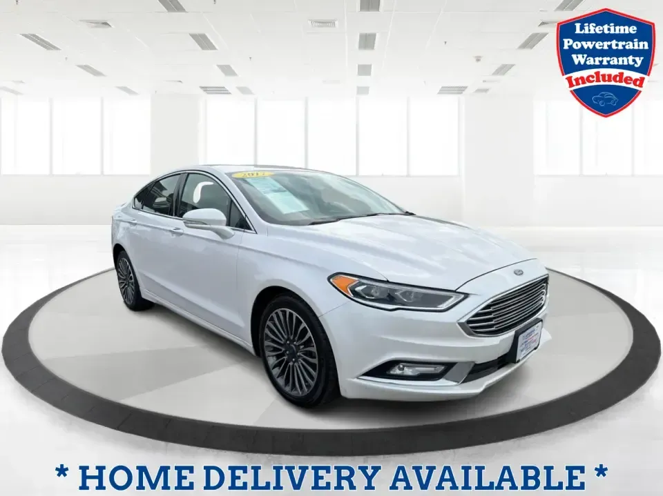 2017 Ford Fusion SE (3FA6P0T99HR) with an EcoBoost 2L I-4 gasoline direct injection engine, 6A transmission, located at 1230 East Main St, Xenia, OH, 45385, (937) 908-9800, 39.688026, -83.910172 - Built for real life in the Miami Valley-school drop-offs, long commutes, and weekend getaways-this 2017 Ford Fusion SE is the kind of sedan that fits smoothly into a busy schedule while still feeling comfortable and confident on the road. Finished in crisp Oxford White, it's a smart pick for commute- Photo#0